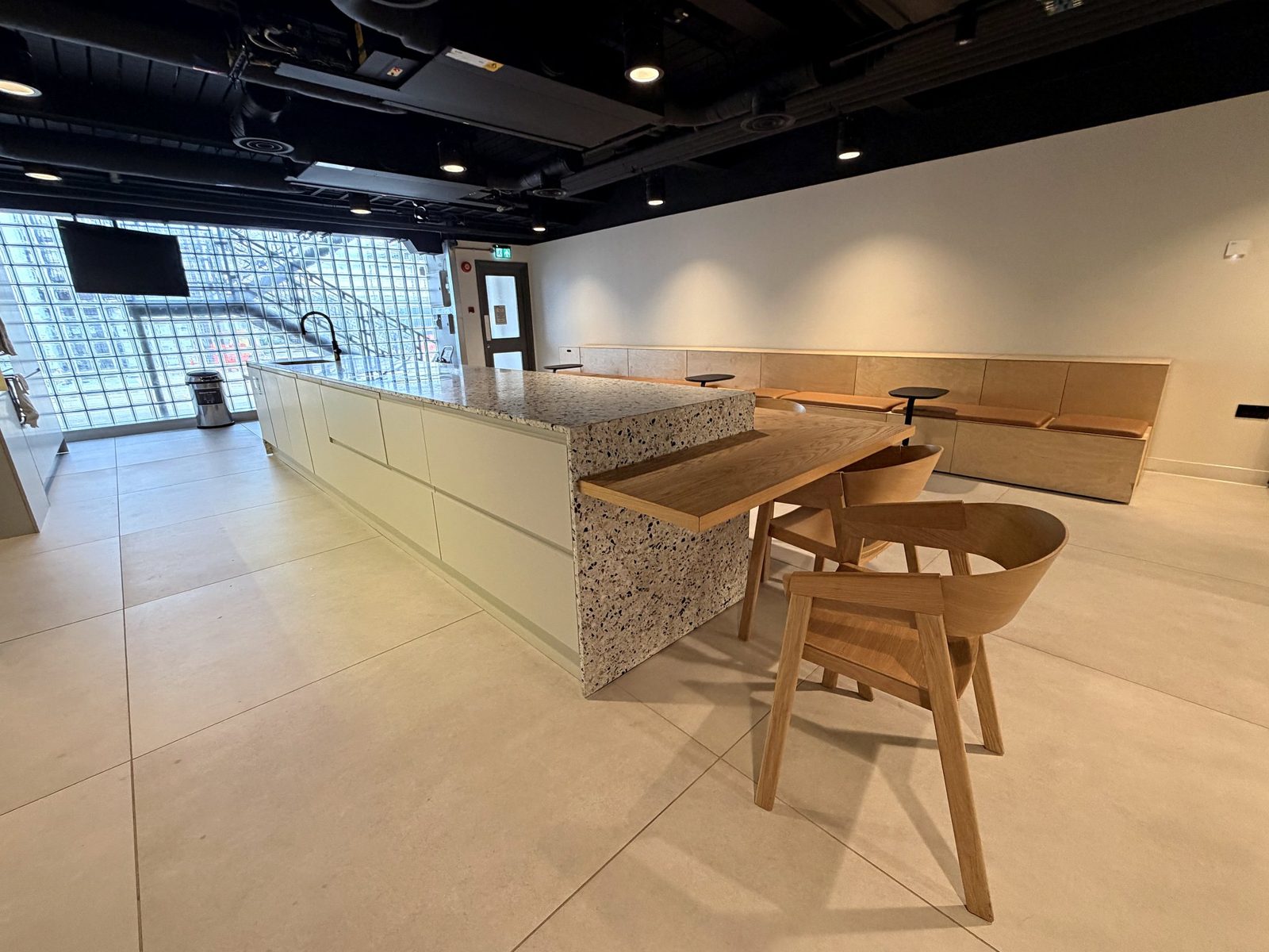 Booth seating beside the kitchen